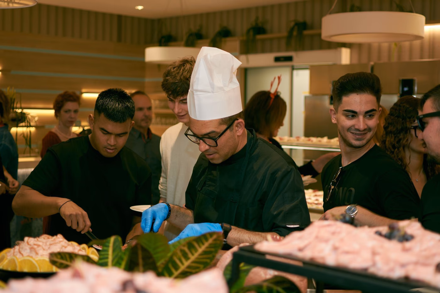 private chef cooking a pregnancy-safe menu for an expectant mother in a home kitchen