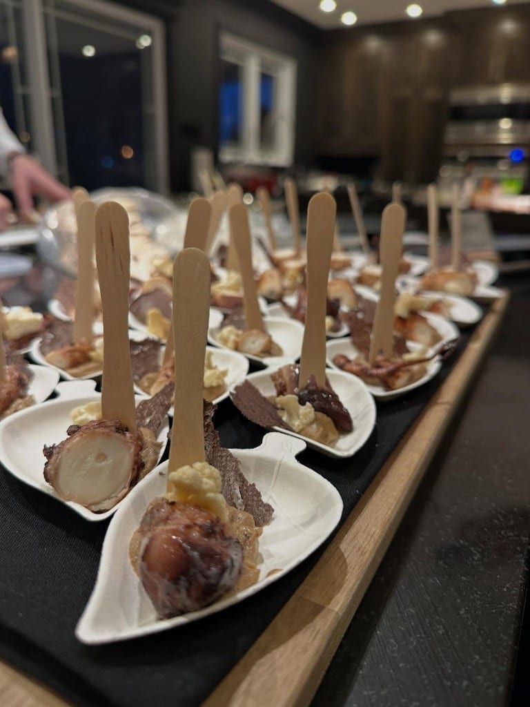 Seafood bites presented on leaf-shaped plates